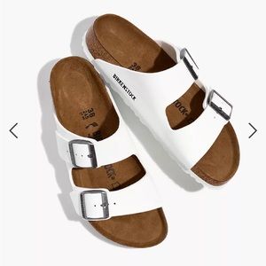 White Birkenstock Arizona sandals